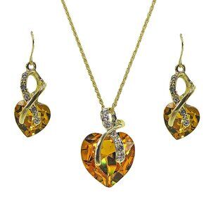 Crystal topaz yellow color heart pendant earring set with crystal and gold wrap
